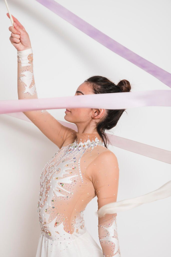 rythmic-gymnast-posing-with-ribbon_1